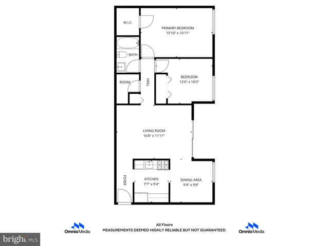 a picture of a bench in front of a wall