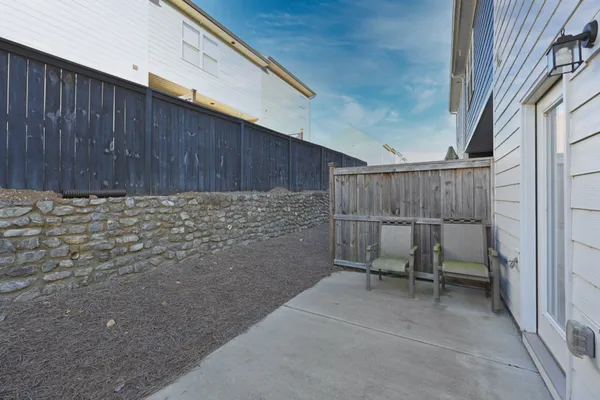 a backyard of a house with seating space