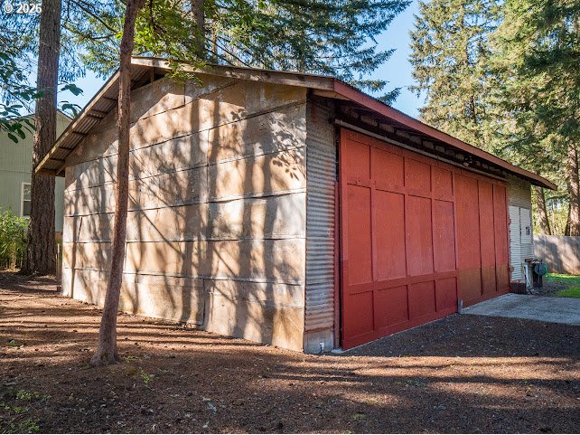 87974 8th Street Veneta, OR 97487 - Photo 14 of 48 a view of a house with a door and a large tree