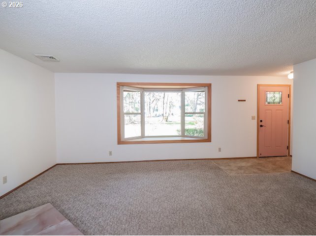87974 8th Street Veneta, OR 97487 - Photo 22 of 48 an empty room with a empty space and windows