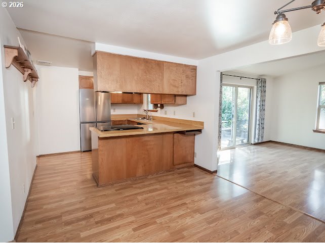 87974 8th Street Veneta, OR 97487 - Photo 26 of 48 a kitchen with stainless steel appliances granite countertop a sink stove and refrigerator