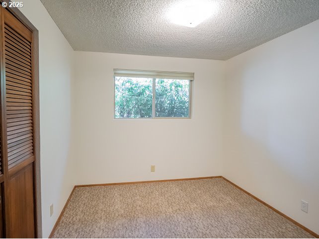 87974 8th Street Veneta, OR 97487 - Photo 37 of 48 an empty room with windows