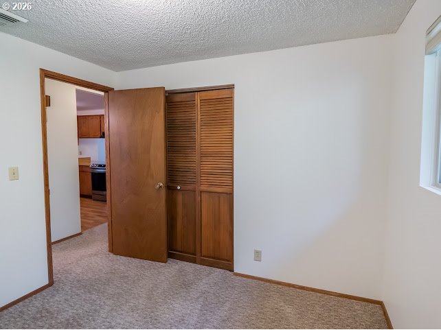 87974 8th Street Veneta, OR 97487 - Photo 39 of 48 an empty room with closet