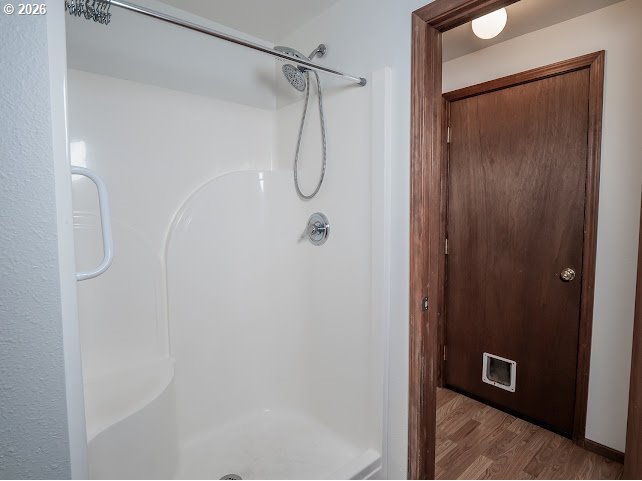 87974 8th Street Veneta, OR 97487 - Photo 44 of 48 a bathroom with a glass shower door