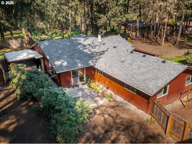 87974 8th Street Veneta, OR 97487 - Photo 8 of 48 a view of a backyard with large trees