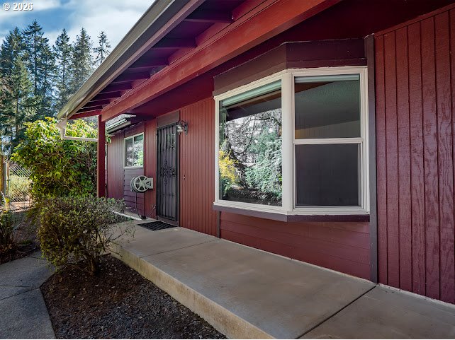 87974 8th Street Veneta, OR 97487 - Photo 10 of 48 a front view of a house with a yard