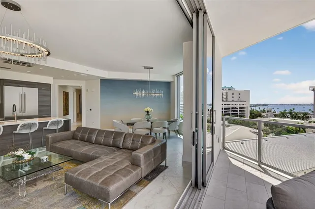 a spacious bedroom with a bed and a couch