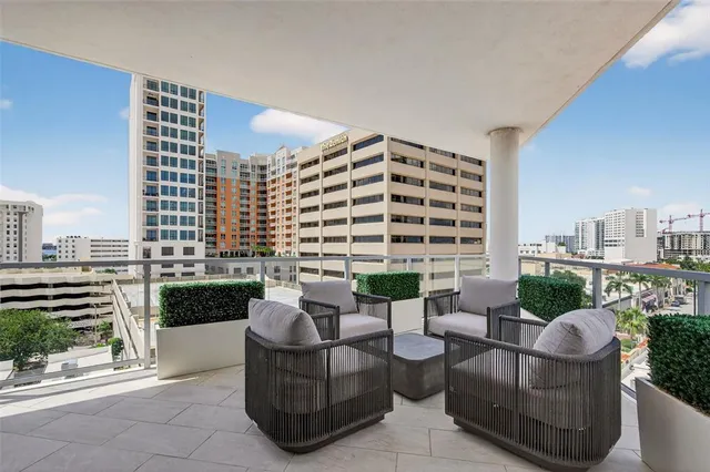 a bathroom with a sink a vanity and a window