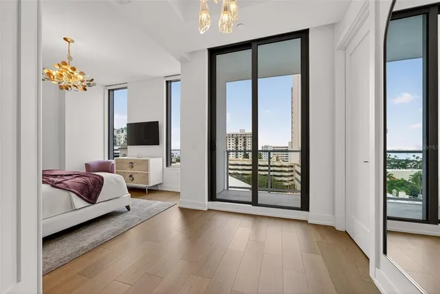 a bathroom with a shower sink and mirror