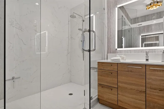 a bed room with a bed and a large window