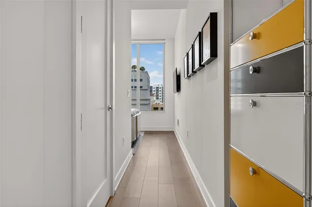 a view of a house with a palm tree