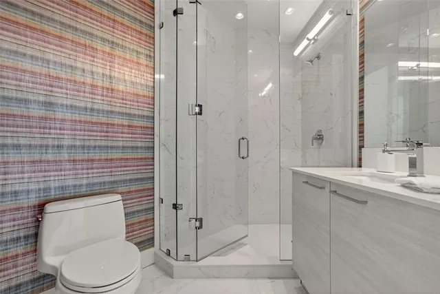 a view of a swimming pool with a lounge chairs