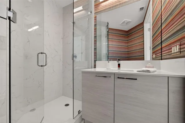 a outdoor living space with patio furniture and a fireplace