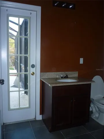 a view of a swimming pool with a yard