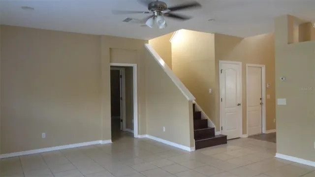 a view of a hallway with staircase