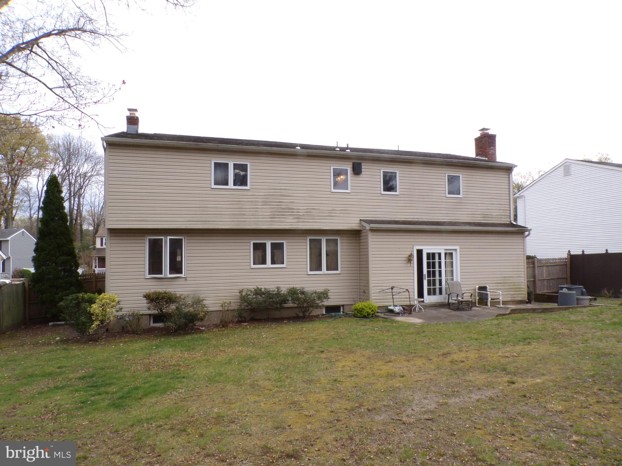 65 Trent Road Blackwood, NJ 08012 - Photo 20 of 23 a front view of a house with a yard