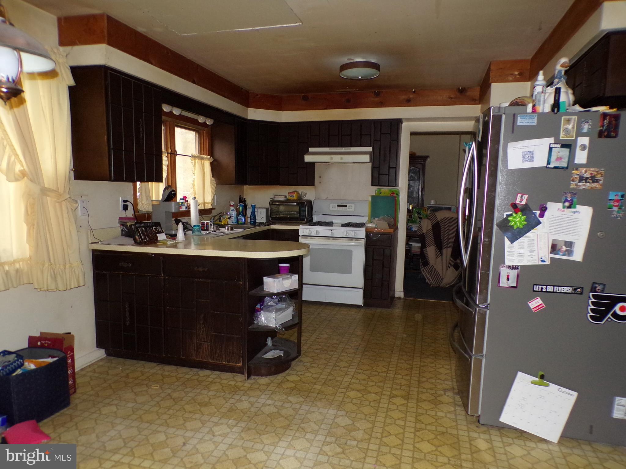 65 Trent Road Blackwood, NJ 08012 - Photo 2 of 23 a kitchen with a sink appliances and cabinets