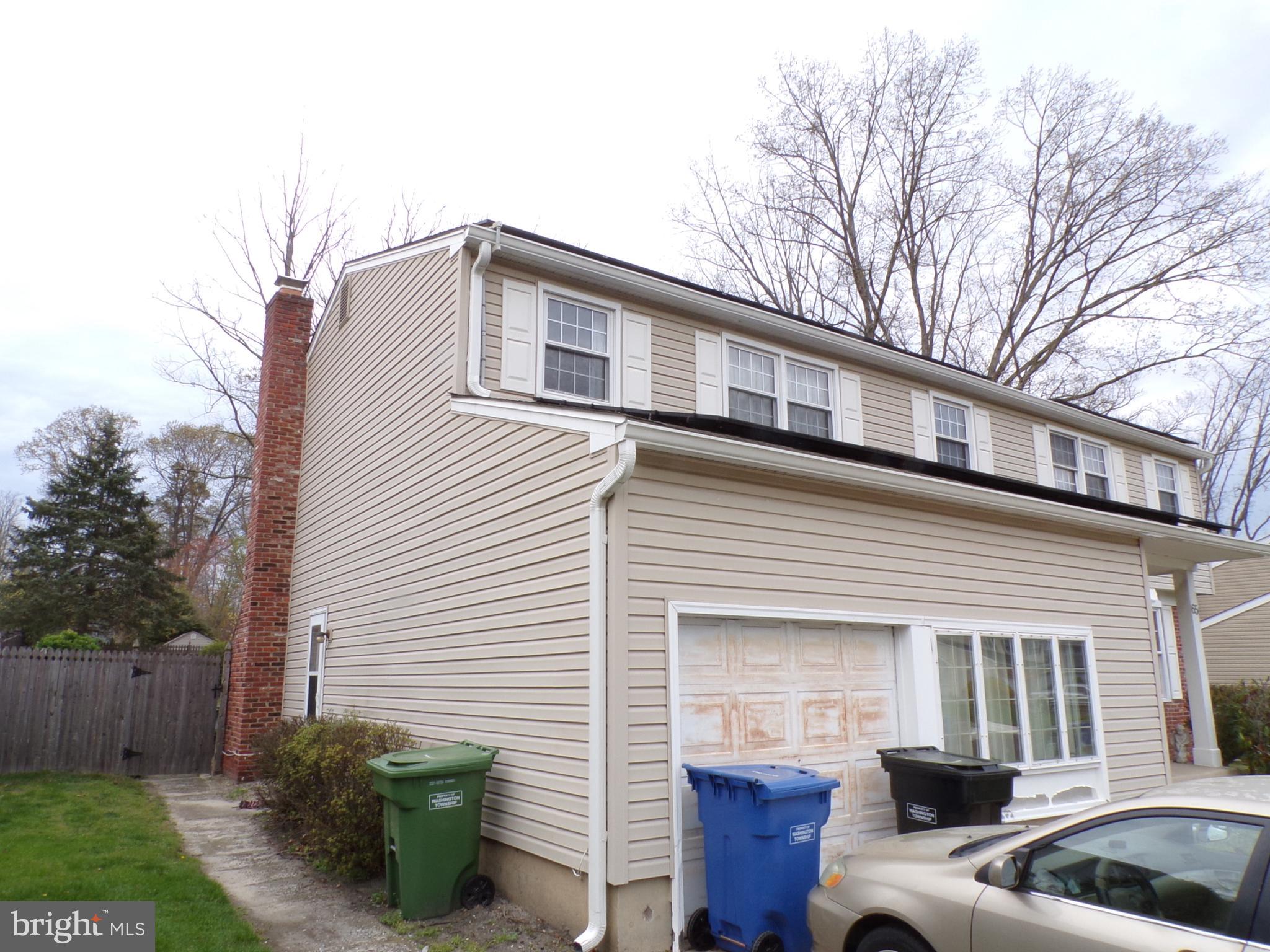65 Trent Road Blackwood, NJ 08012 - Photo 21 of 23 a front view of a house with garden