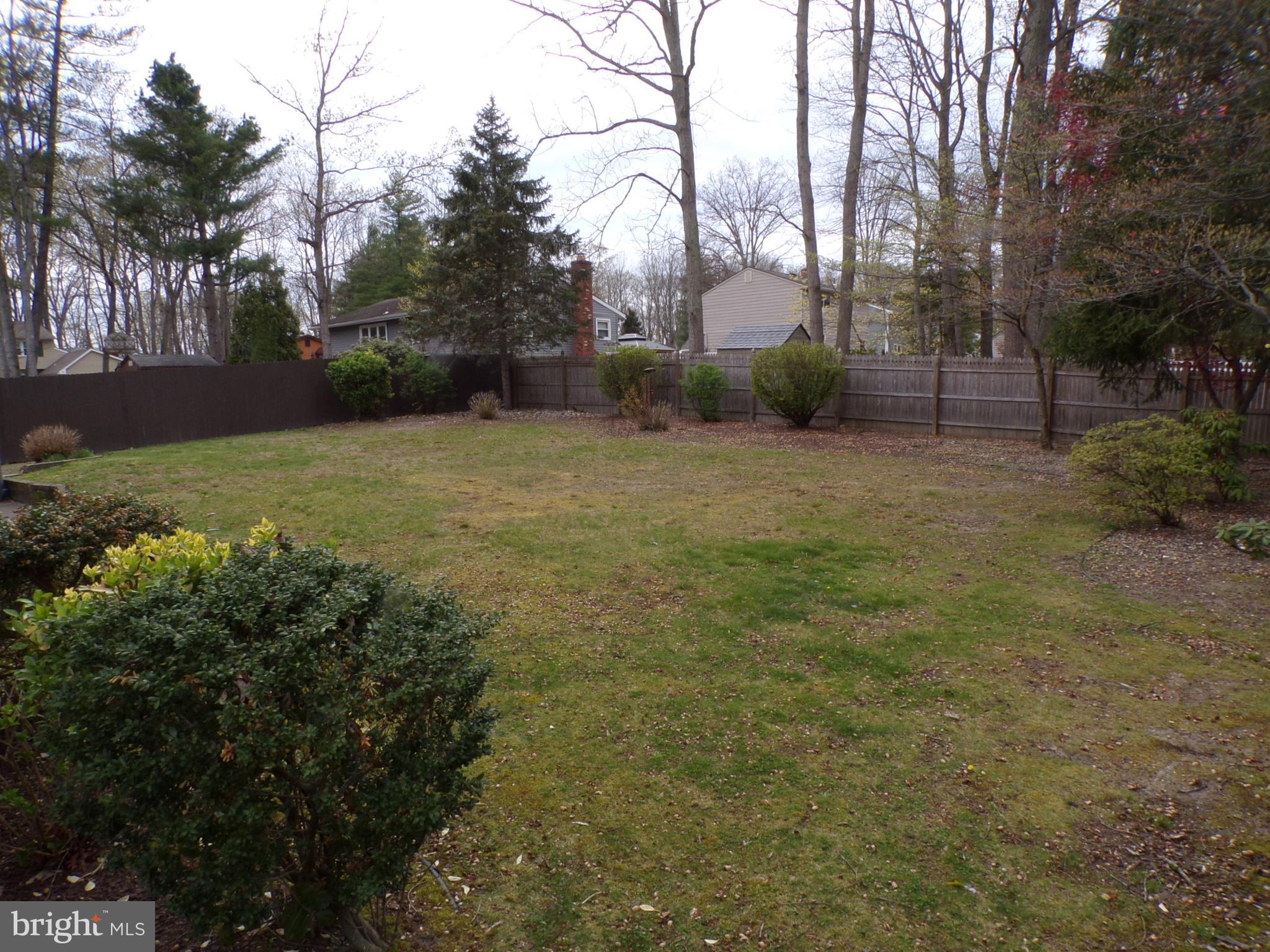 65 Trent Road Blackwood, NJ 08012 - Photo 23 of 23 a backyard of a house with lots of green space