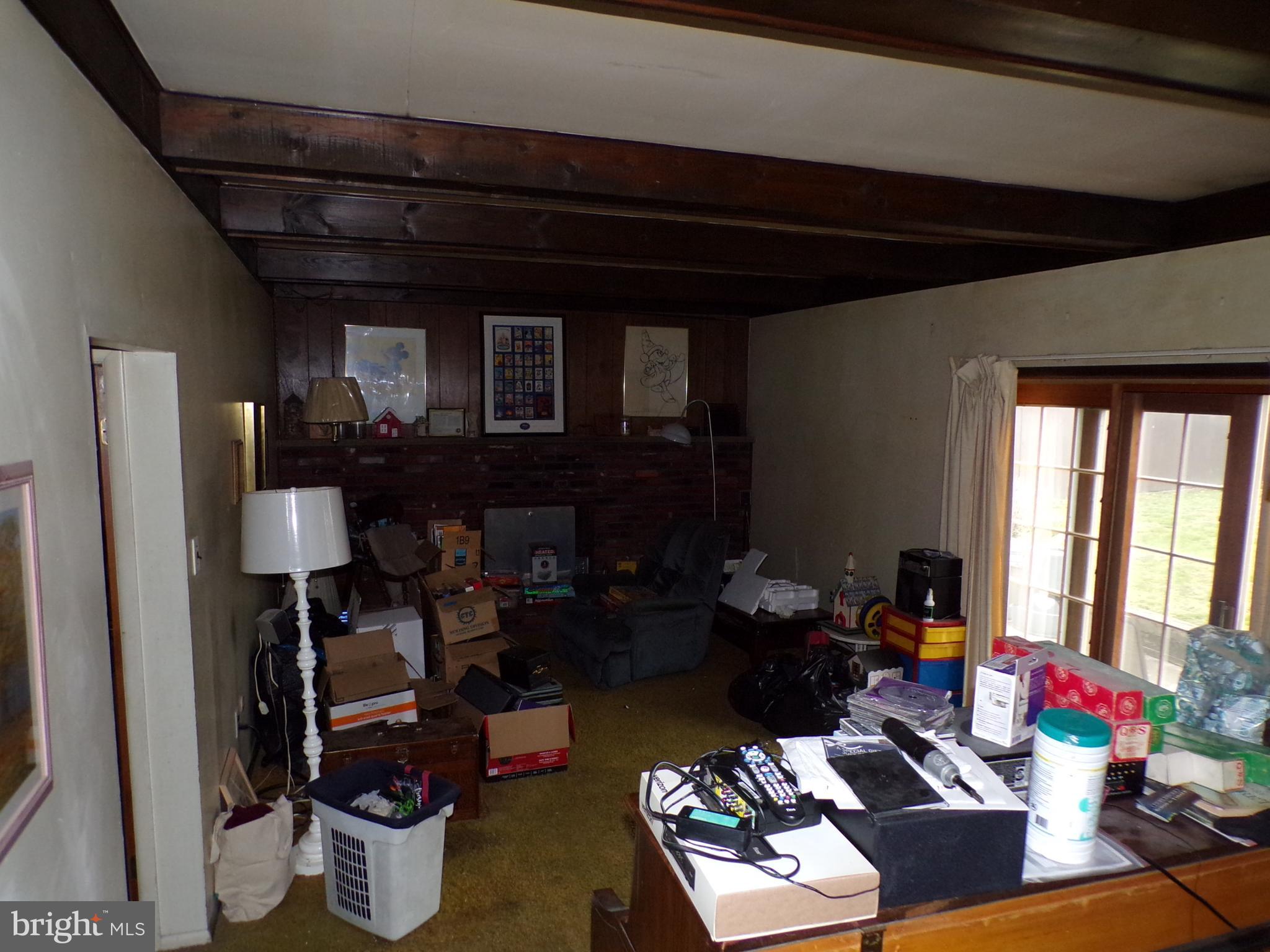 65 Trent Road Blackwood, NJ 08012 - Photo 3 of 23 a living room with furniture and a fireplace