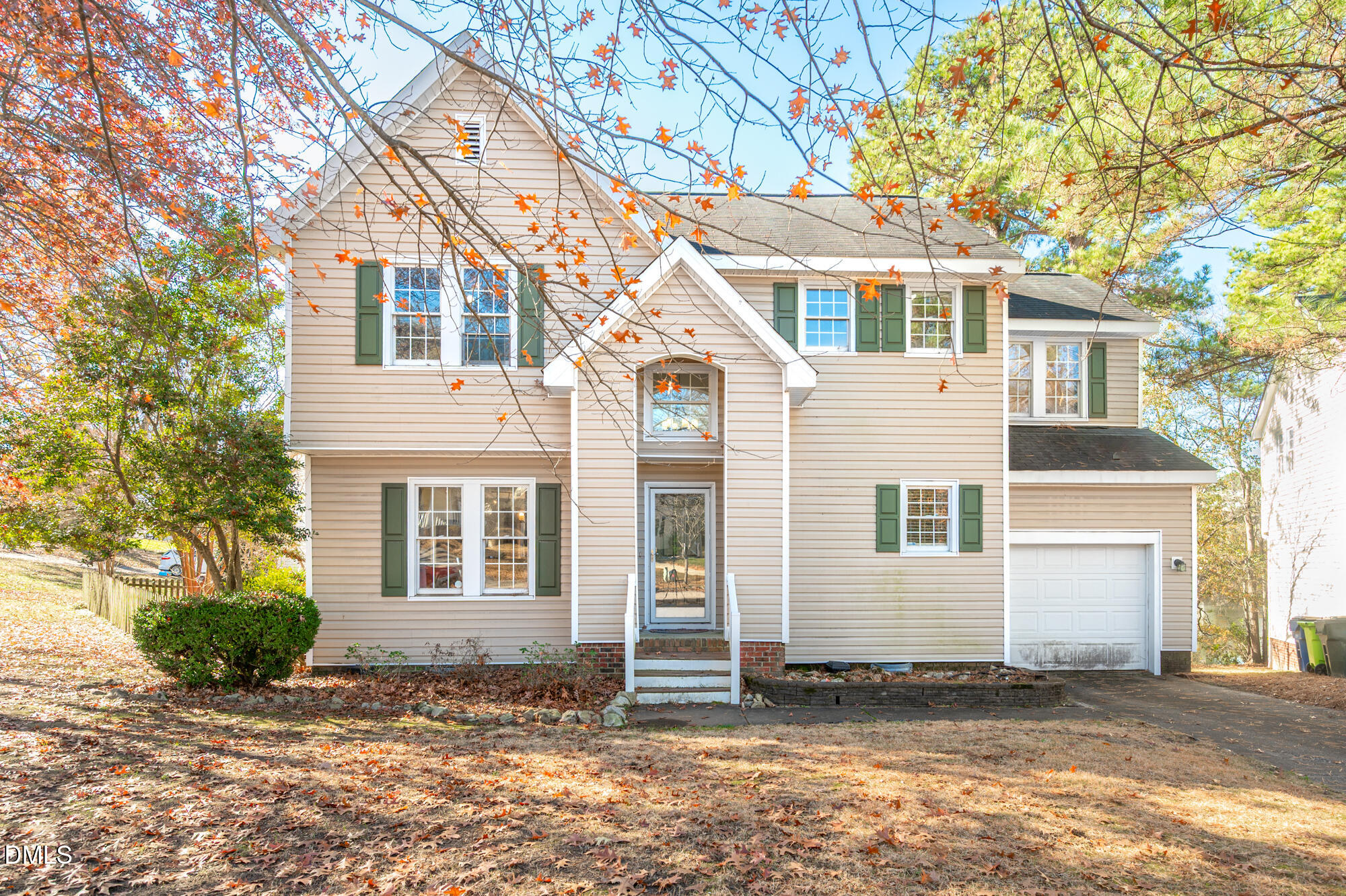 701 Thistlegate Trail Raleigh, NC 27610 - Photo 2 of 53 a view of a house with a yard