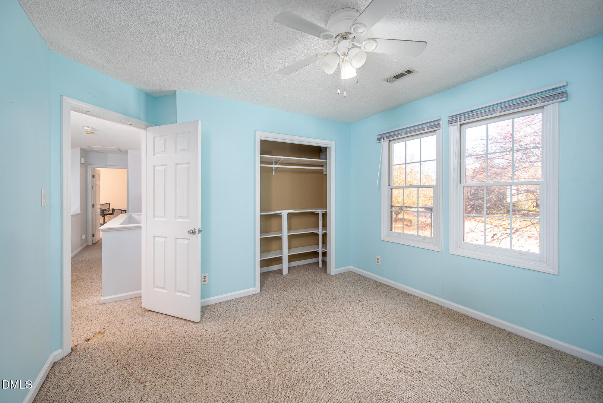 701 Thistlegate Trail Raleigh, NC 27610 - Photo 24 of 53 a view of livingroom with hardwood floor and workspace