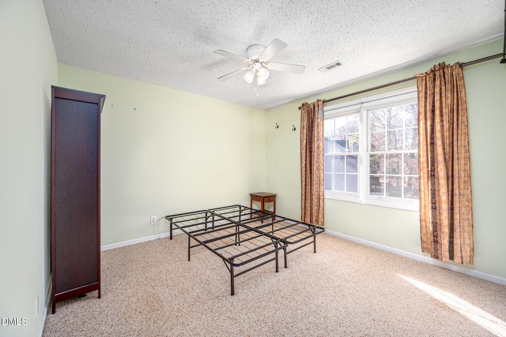 701 Thistlegate Trail Raleigh, NC 27610 - Photo 26 of 53 a living room with furniture and a chandelier