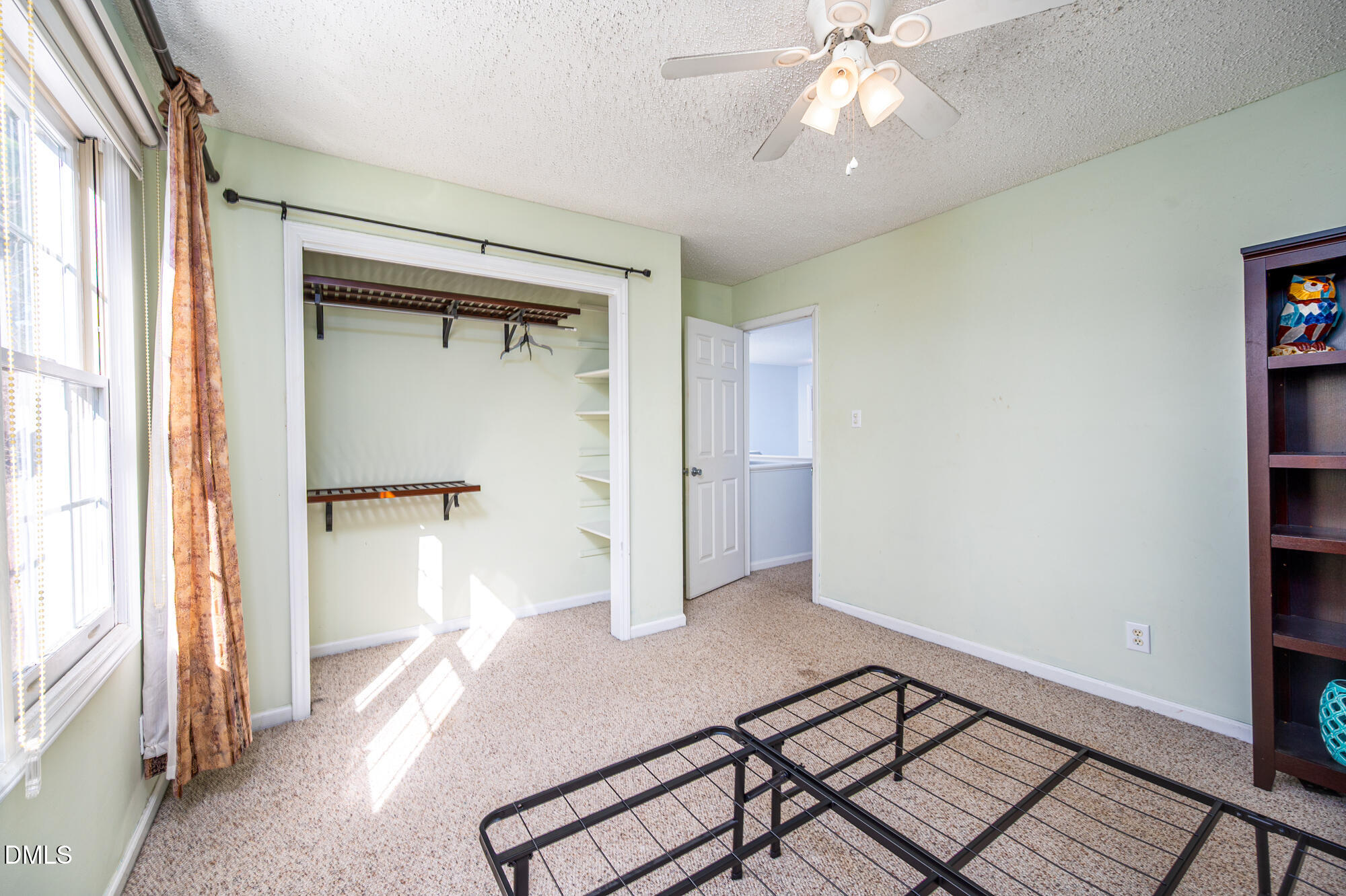 701 Thistlegate Trail Raleigh, NC 27610 - Photo 27 of 53 wooden floor in an empty room with a window