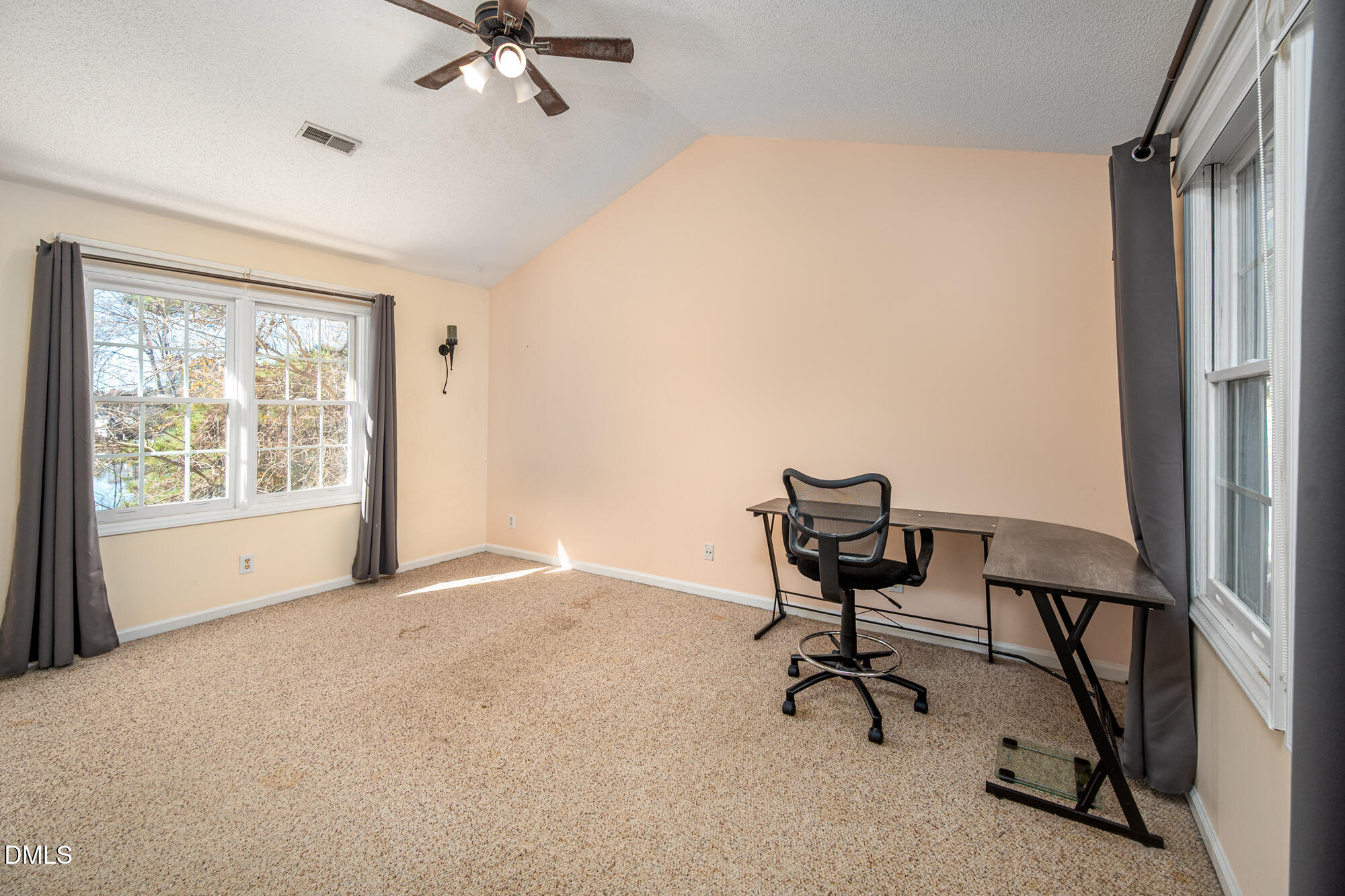 701 Thistlegate Trail Raleigh, NC 27610 - Photo 29 of 53 a view of a workspace with furniture and a window