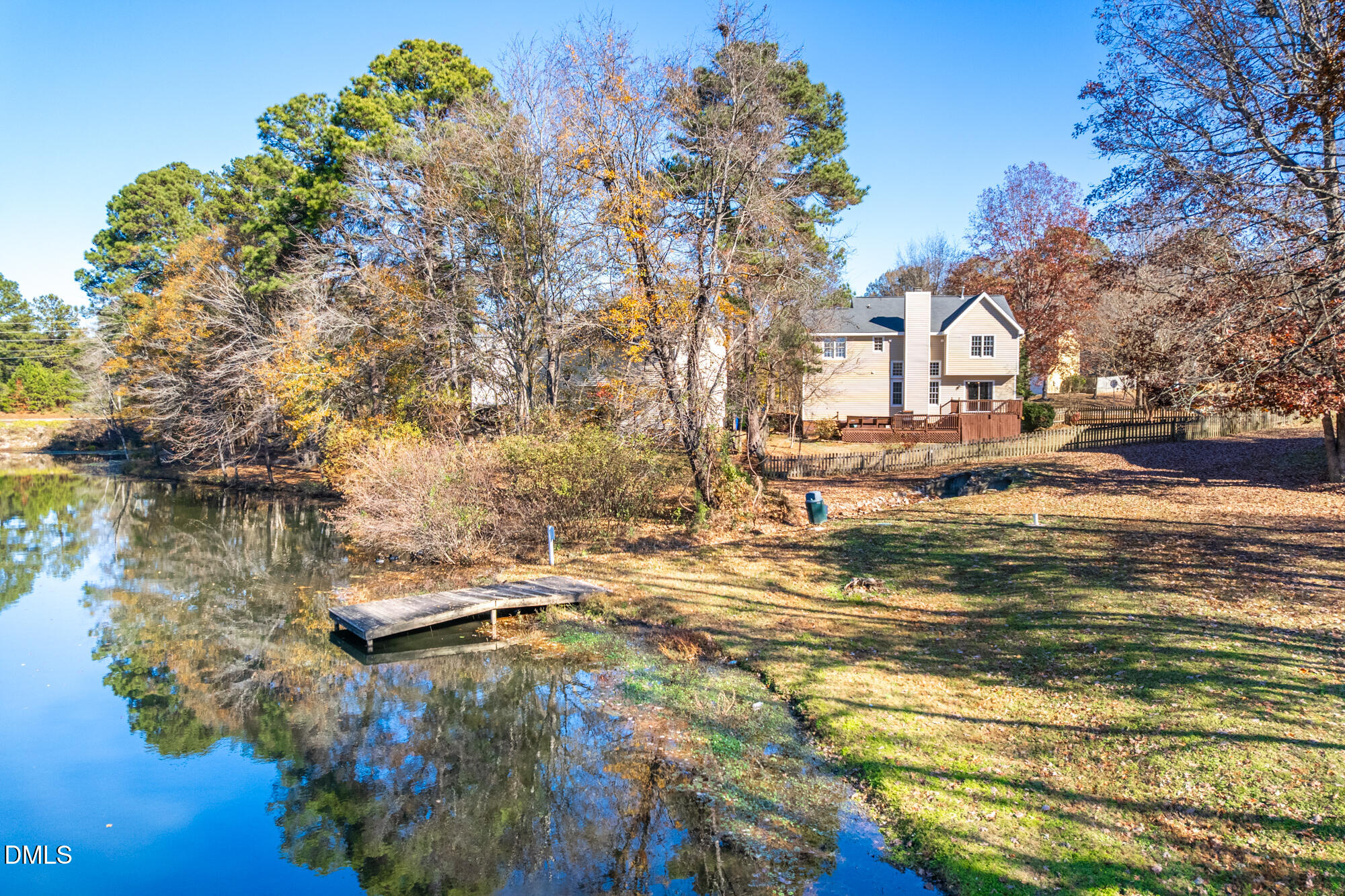 701 Thistlegate Trail Raleigh, NC 27610 - Photo 3 of 53 a view of a houses with yard and lake view