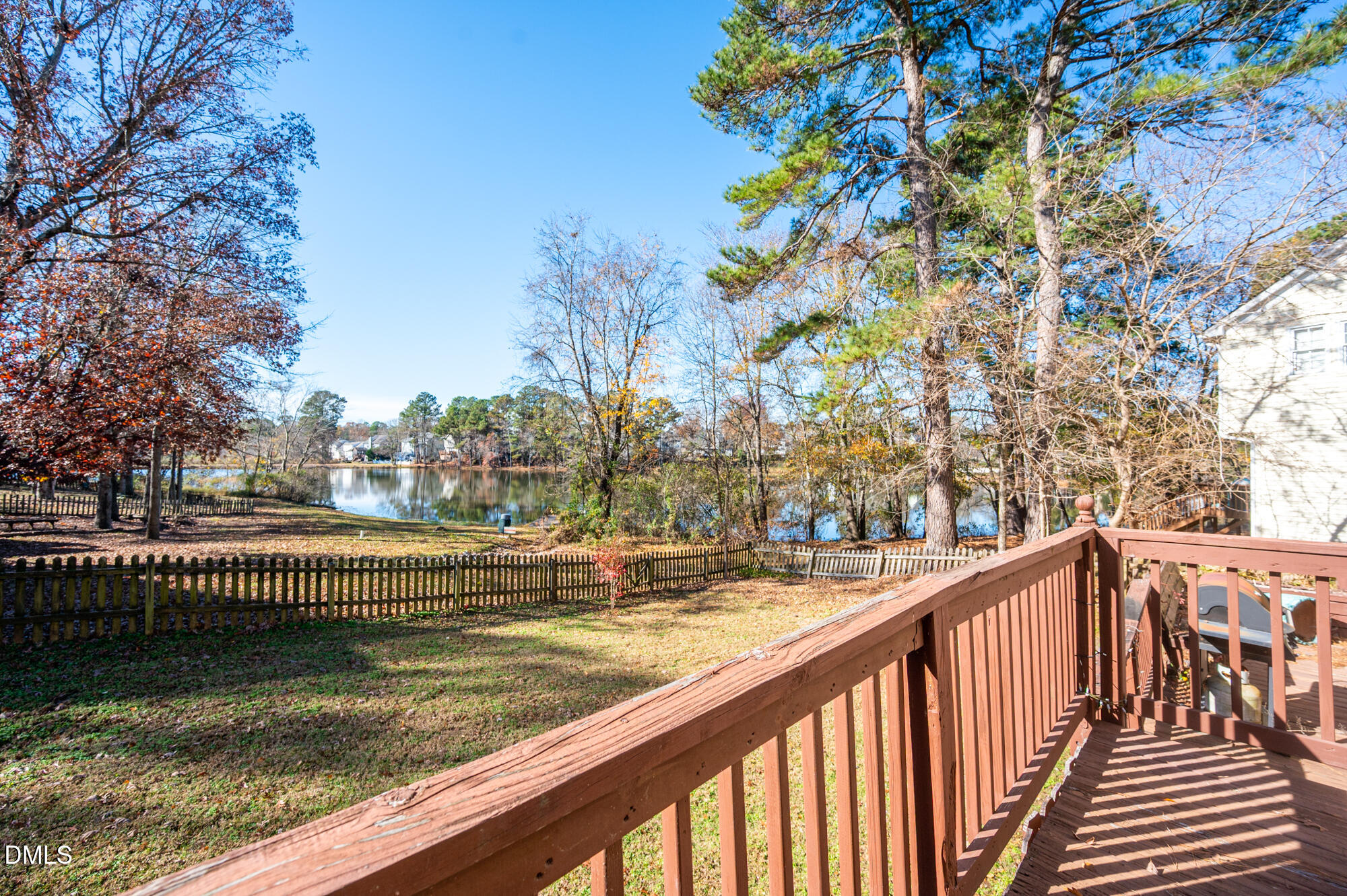701 Thistlegate Trail Raleigh, NC 27610 - Photo 37 of 53 a view of a balcony with wooden fence