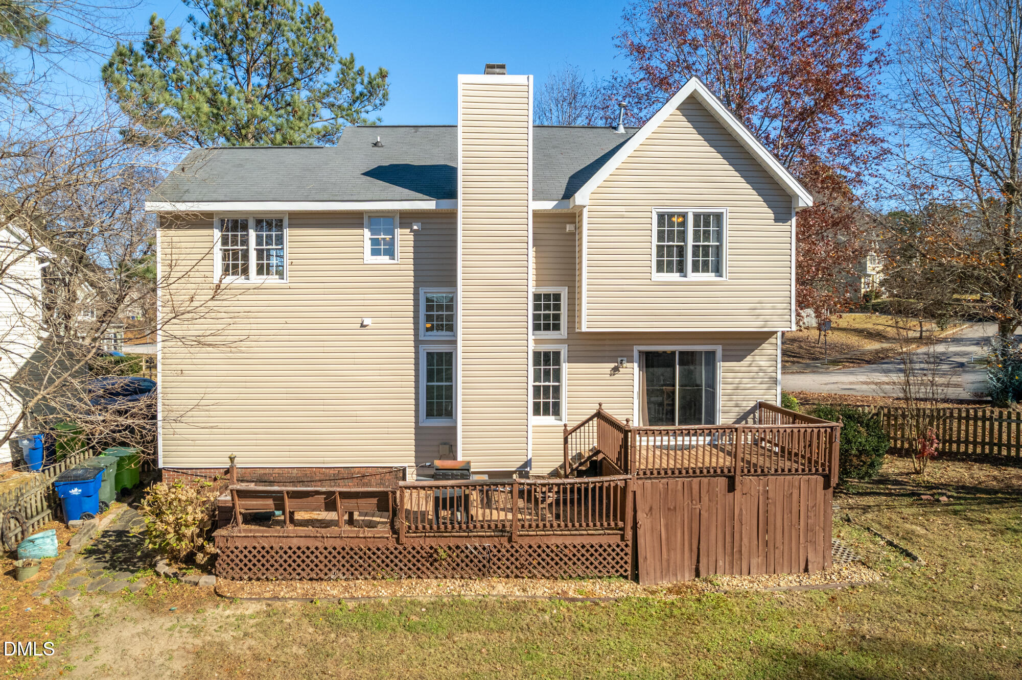 701 Thistlegate Trail Raleigh, NC 27610 - Photo 44 of 53 a front view of house with yard outdoor seating and covered with trees
