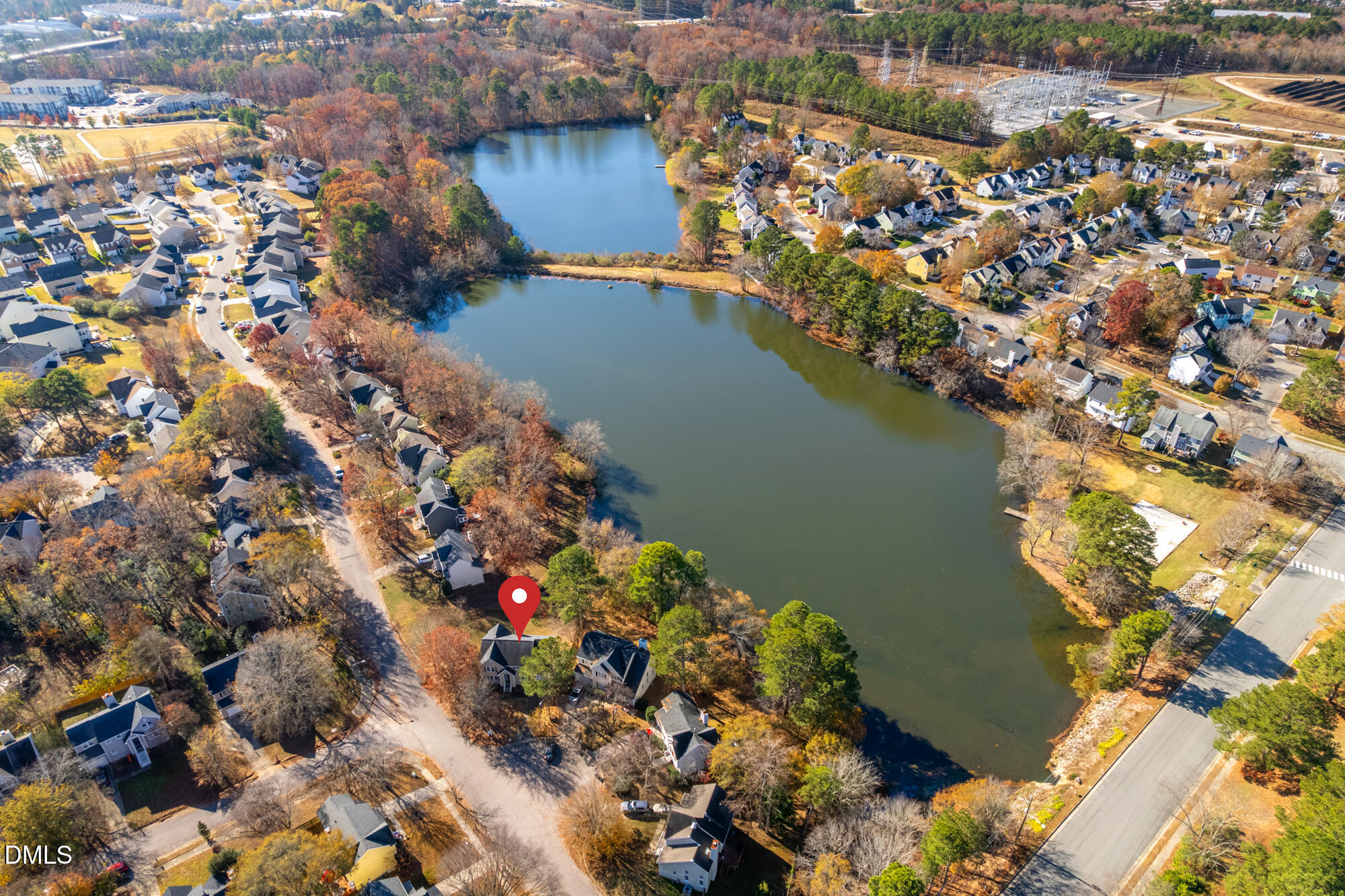 701 Thistlegate Trail Raleigh, NC 27610 - Photo 49 of 53 an aerial view of lake and residential houses with outdoor space