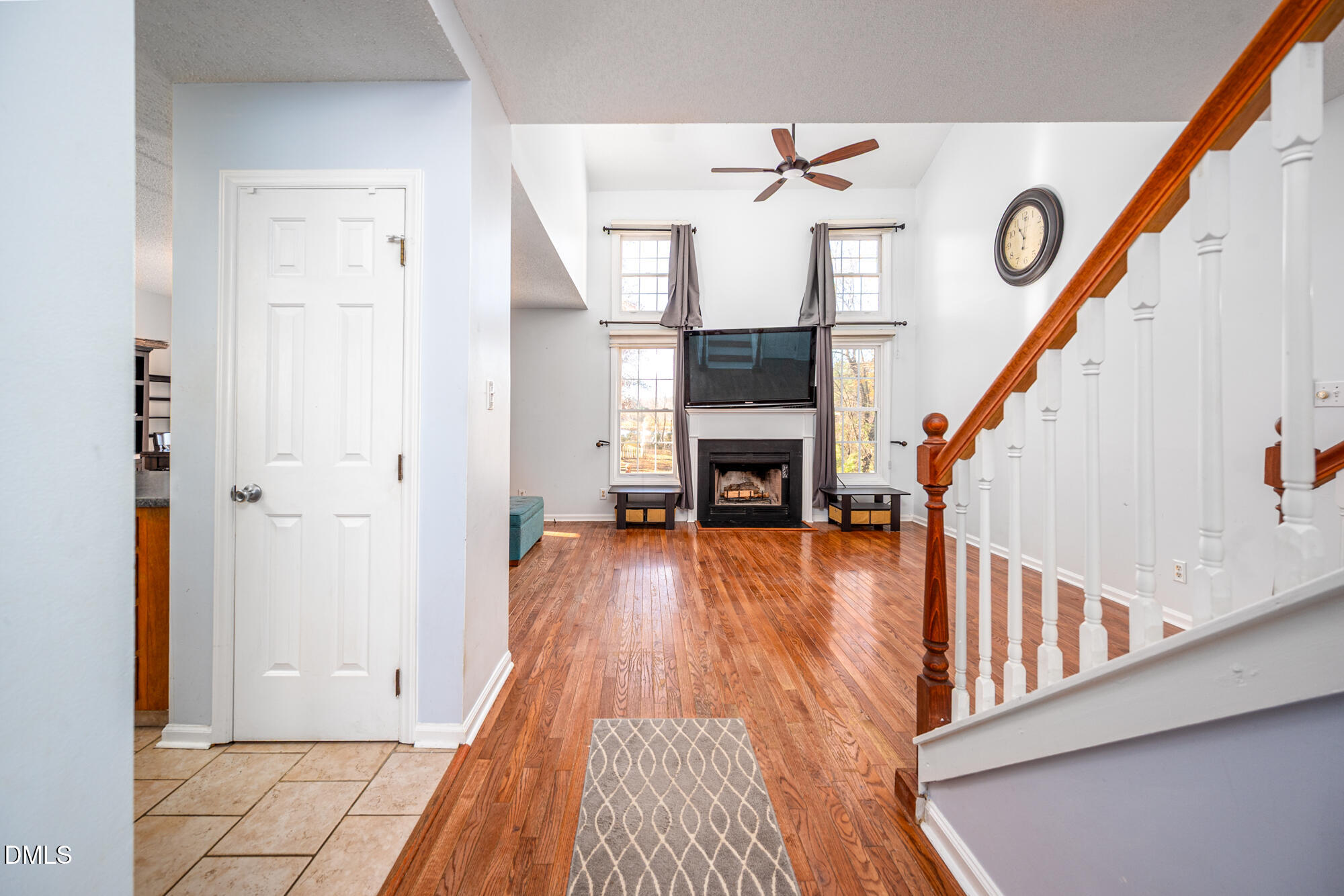 701 Thistlegate Trail Raleigh, NC 27610 - Photo 5 of 53 a view of entryway and hall with wooden floor