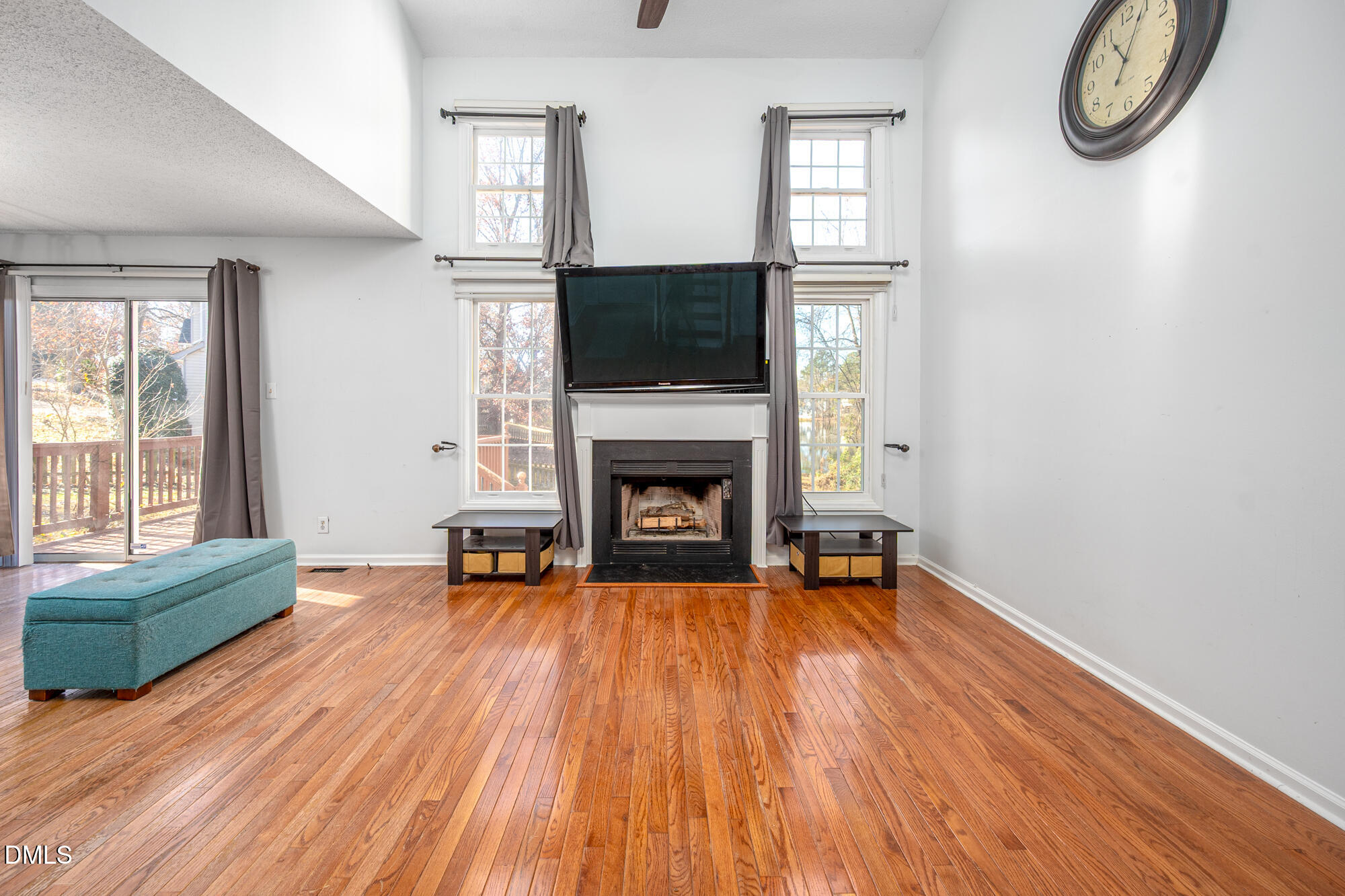 701 Thistlegate Trail Raleigh, NC 27610 - Photo 6 of 53 a living room with furniture and a fireplace