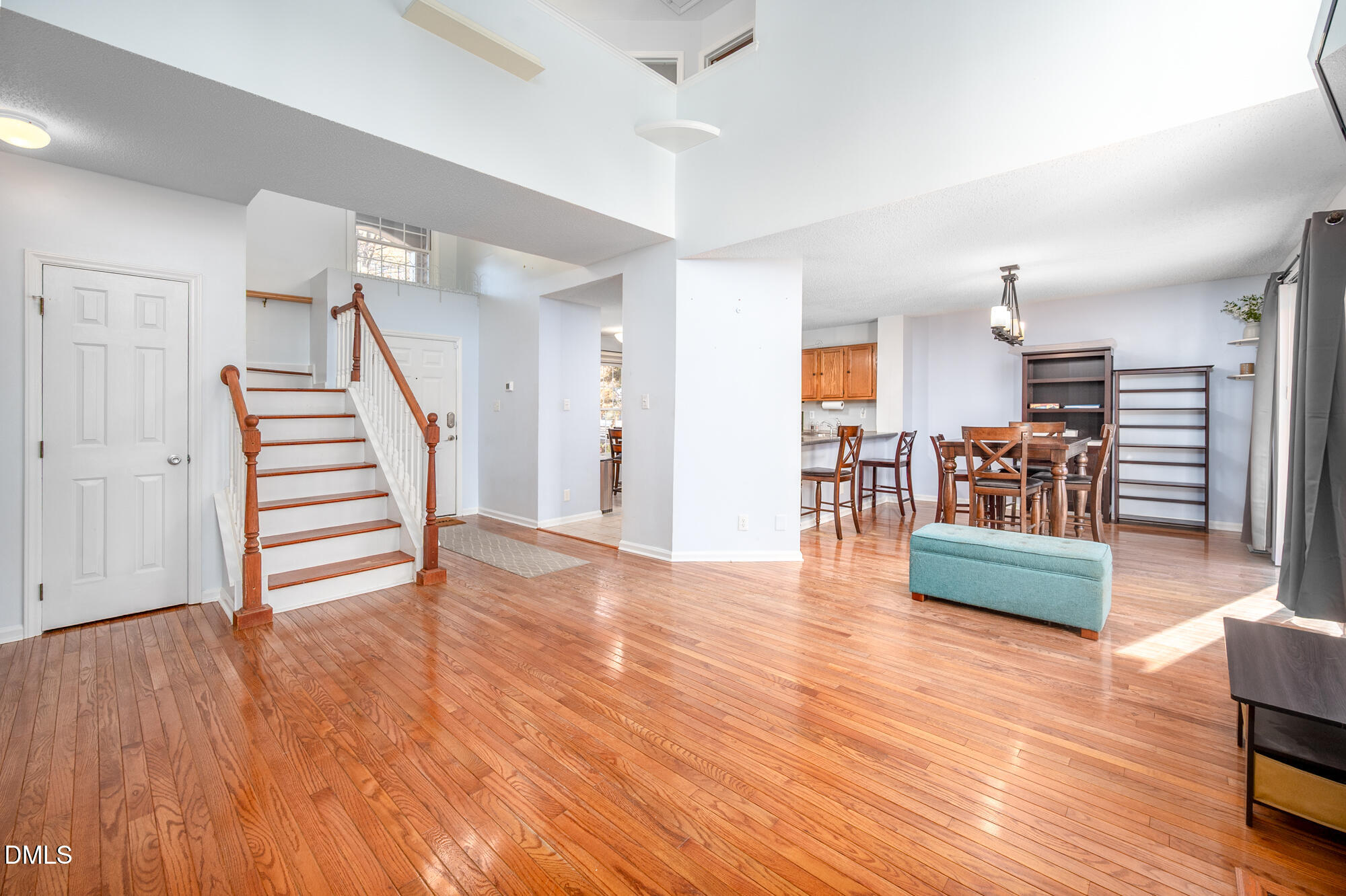 701 Thistlegate Trail Raleigh, NC 27610 - Photo 7 of 53 a view of a livingroom with furniture and wooden floor