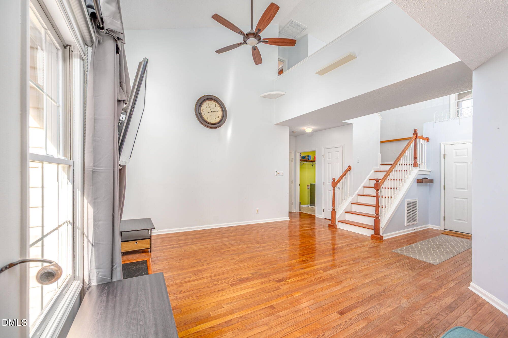 701 Thistlegate Trail Raleigh, NC 27610 - Photo 8 of 53 a view of an entryway with wooden floor