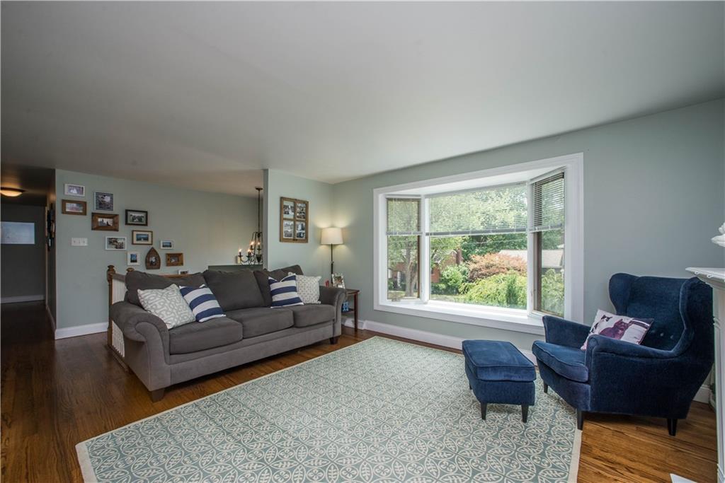 23 Stancey Road Pittsburgh, PA 15220 - Photo 4 of 25 Large living room - painted in beautiful neutral with gleaming hardwood floors.
