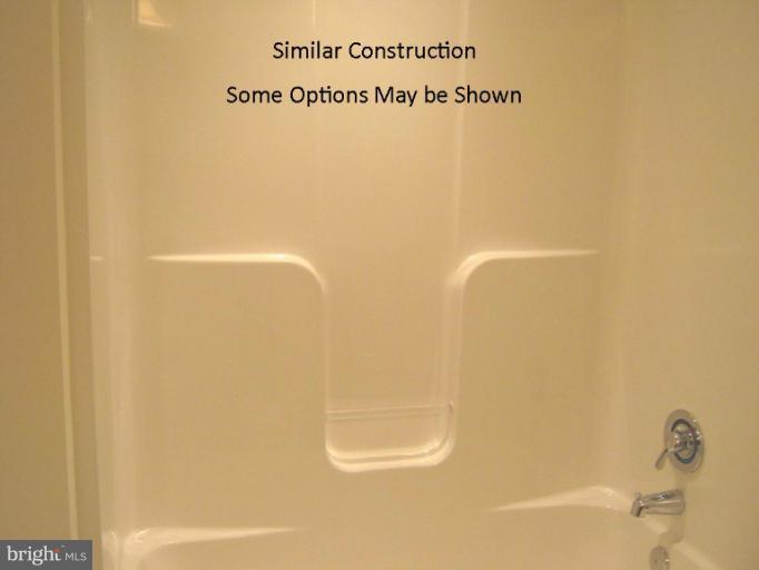 3 Steed Street Ranson, WV 25438 - Photo 11 of 25 a bathroom with a shower