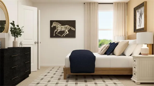 a bedroom with a bed and painting on the wall