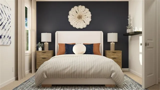 a bedroom with a bed and a mirror