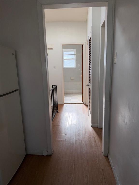 1362 68th Street Brooklyn, NY 11219 - Photo 2 of 11 a view of hallway with wooden floor