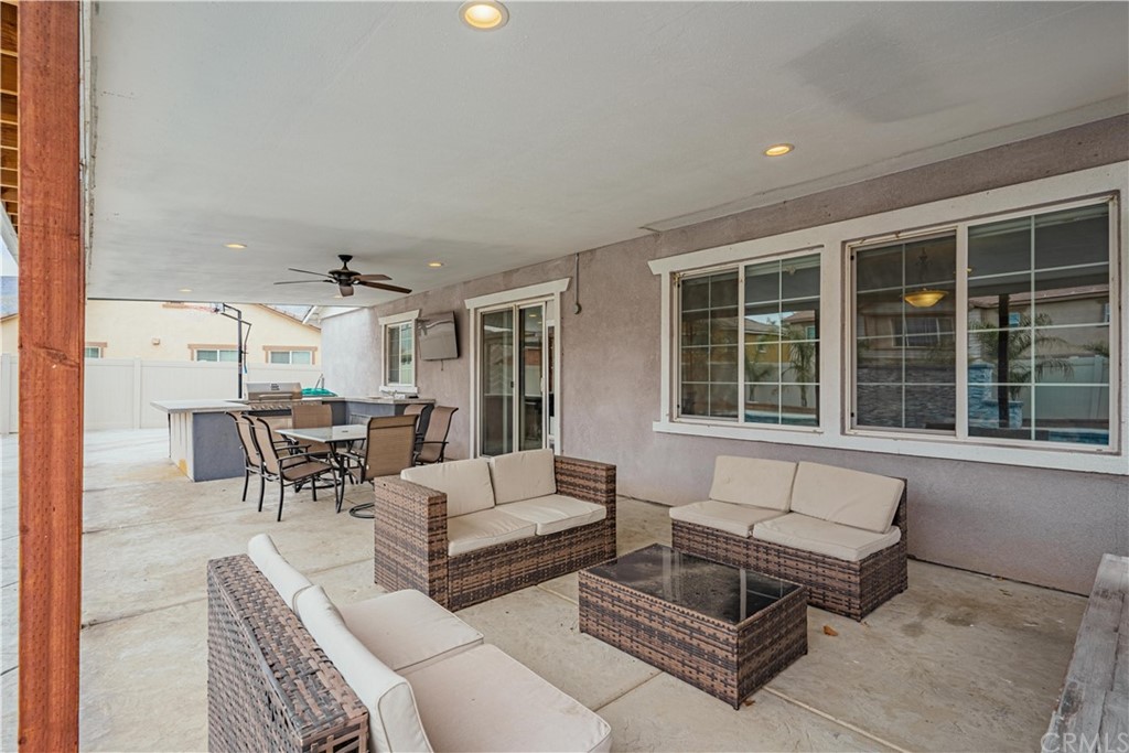 2090 Trinket Circle San Jacinto, CA 92582 - Photo 32 of 43 a living room with furniture and a large window