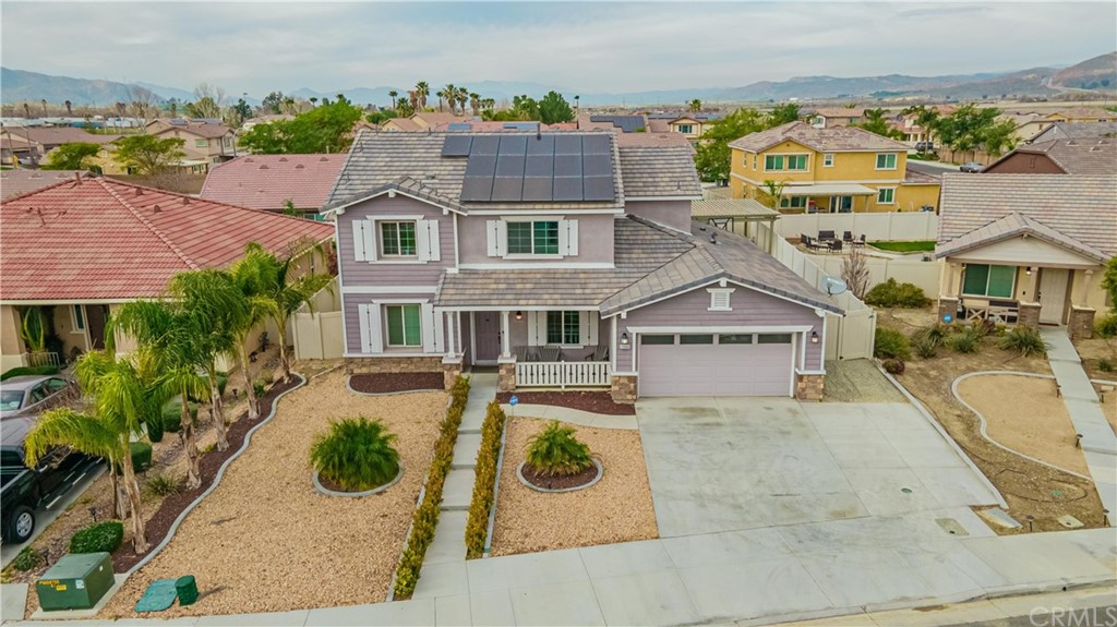 2090 Trinket Circle San Jacinto, CA 92582 - Photo 42 of 43 an aerial view of residential houses with outdoor space and parking