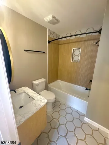 a bathroom with a sink and a shower