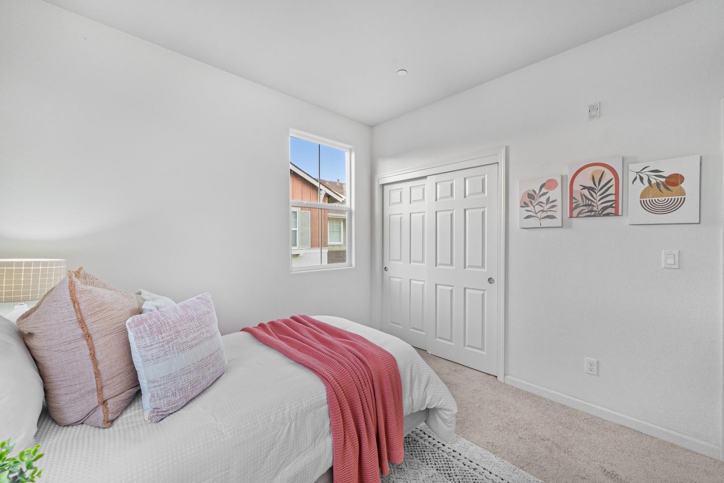 1088 Mallow Terrace San Jose, CA 95133 - Photo 18 of 36 a bedroom with a bed and a window