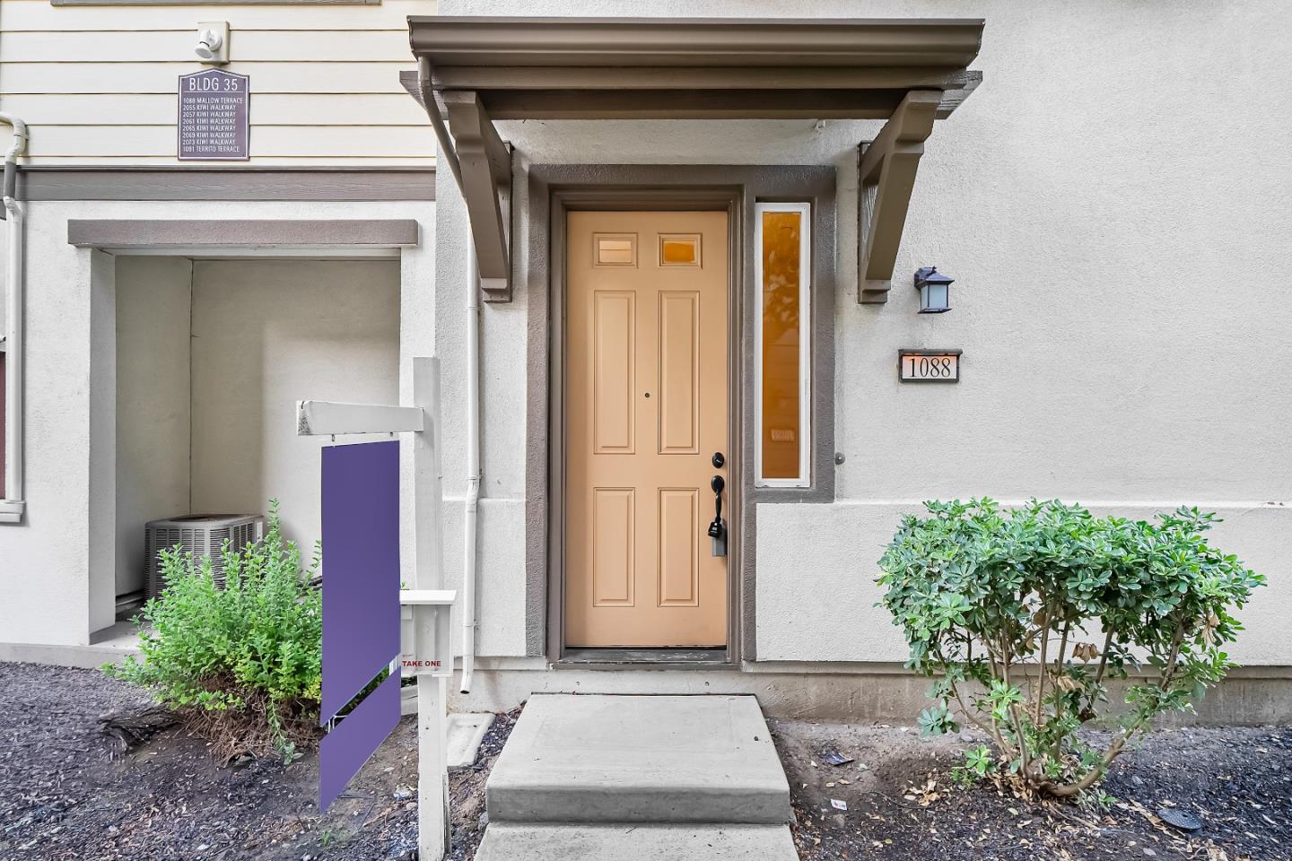 1088 Mallow Terrace San Jose, CA 95133 - Photo 2 of 36 a front view of a house with a yard