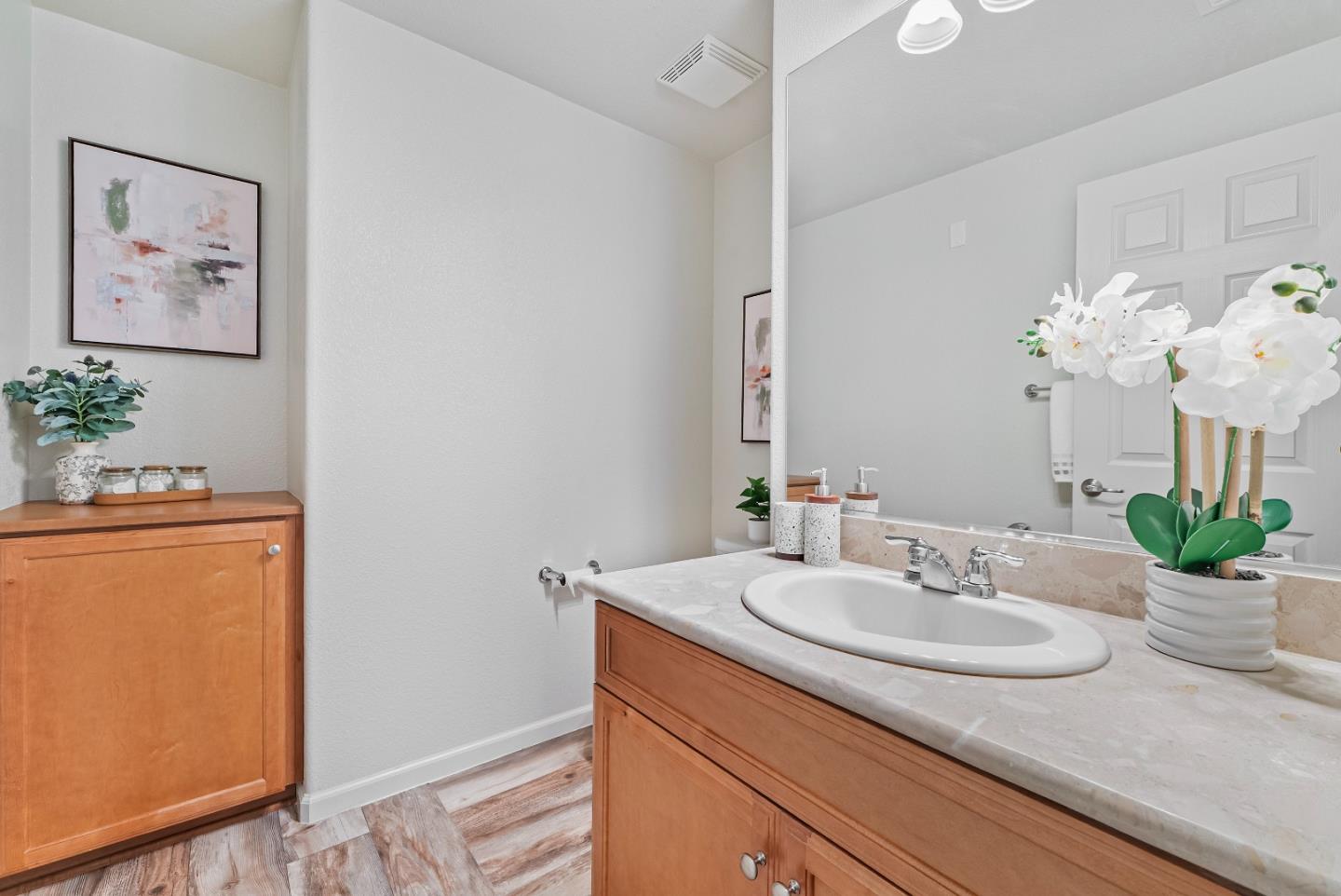 1088 Mallow Terrace San Jose, CA 95133 - Photo 25 of 36 a bathroom with a sink double vanity and a mirror