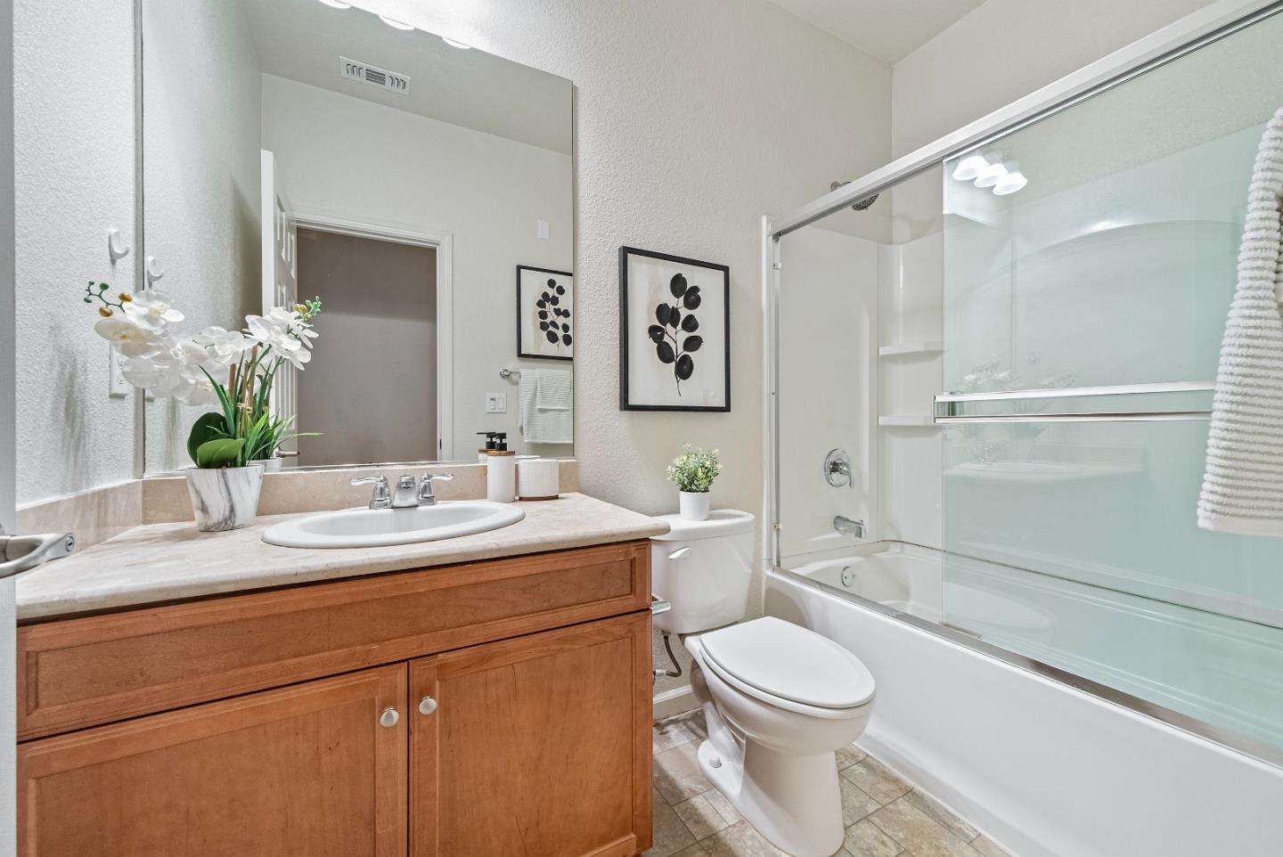 1088 Mallow Terrace San Jose, CA 95133 - Photo 26 of 36 a bathroom with a sink a toilet and shower