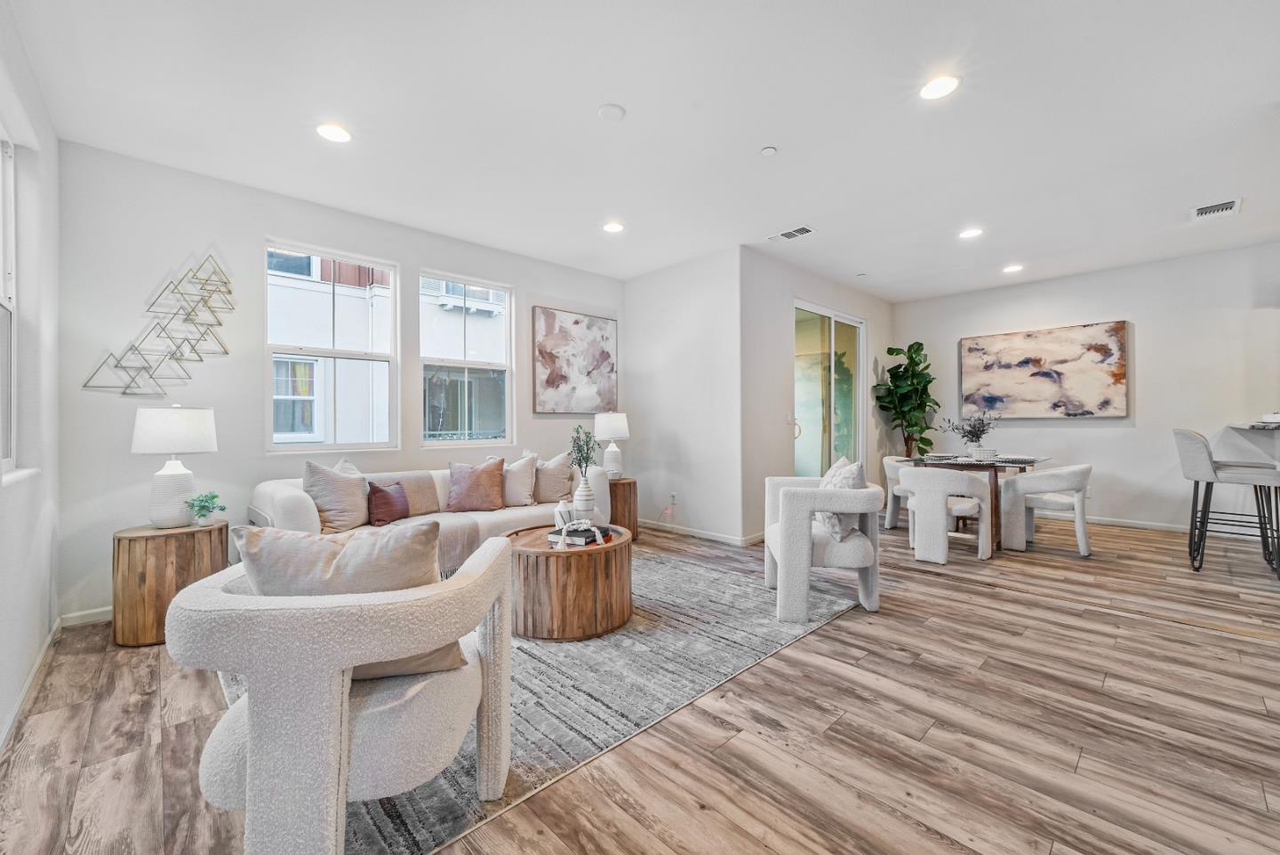 1088 Mallow Terrace San Jose, CA 95133 - Photo 6 of 36 a living room with furniture and wooden floor